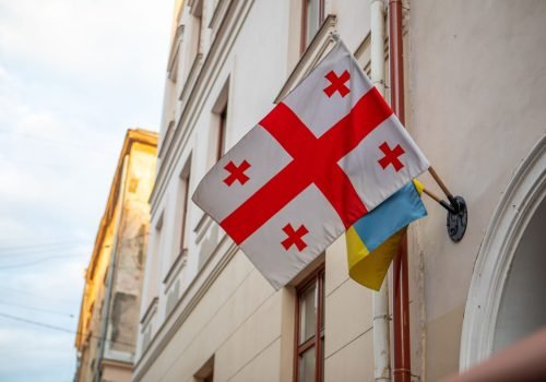 georgia and ukraine flag on the wall copy space